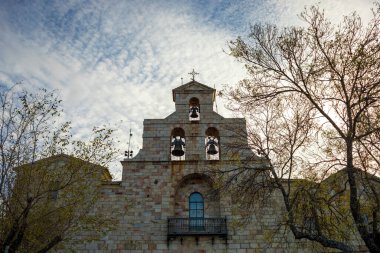 Basilica and royal sanctuary of the Virgen de la Cabeza de Andujar, Jaen, Andalusia, Spain, in the Sierra de Andujar natural park clipart