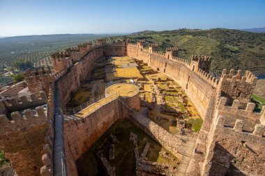 Spectacular view of the interior of the medieval castle of Burgalimar in Baos de la Encina, Jan, Andalusia, Spain with morning light clipart