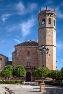Vertical view of the facade of the church of San Mateo de Banos de la Encina in Jaen, Andalucia, Spain, in daylight