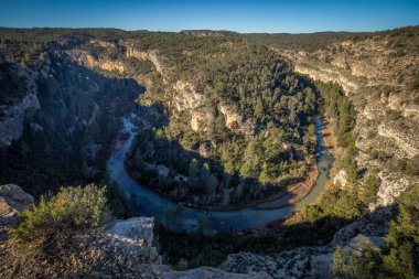 Panoramic view from above of one of the gorges of the Cabriel river Natrual Park in the provinces of Cuenca and Valencia, Spain clipart