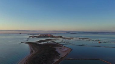 San Pedro del Pinatar Salt Flats Regional Park, Murcia Region, Spain, at dawn from a drone
