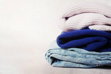 Stack of clothes. Second hand store. Cloth heap