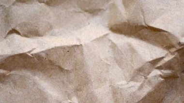 Kahverengi buruşmuş kağıt dokusu. Organik madde.