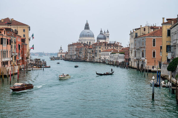 Venice, Italy- Feb 23, 2023: Boats on the Grand Canal  in Venice.
