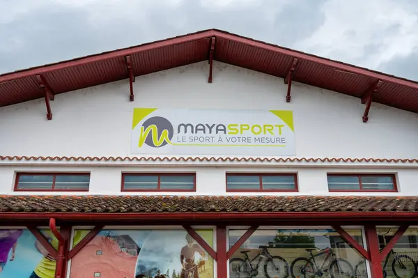 stock image Saint-Jean-Pied-de-Port, France- May 14, 2024:  The front of Maya Sport store in France