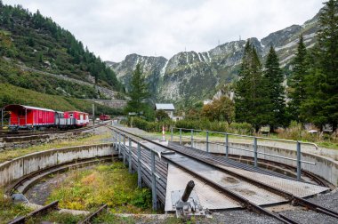 An old swiss railway turntable in the Swiss Apls clipart