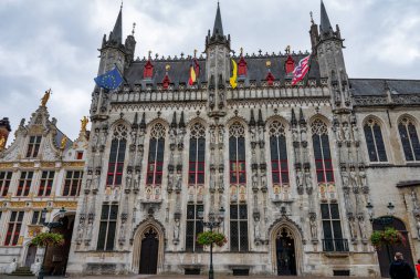 Bruges, Belgium- Sep 27,  2024: The front of Bruges City Hall. clipart