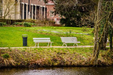 White park benches Infront of Leiden`s observatory, Netherlands 