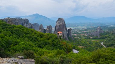 Meteora, Greece. Monastery and famous sandstone rock formations and world Greek heritage. clipart