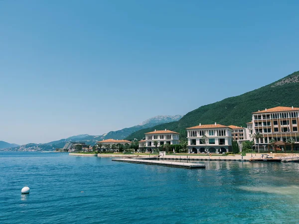 Hotel complex One and Only Portonovi at the foot of the mountains on the shore of the Bay of Kotor. High quality photo