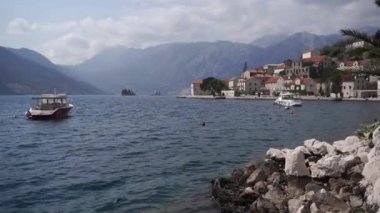 Embankment of the ancient town of Perast on the shore of the Bay of Kotor. High quality FullHD footage