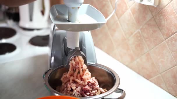 Cook Twists Meat Electric Meat Grinder Pushing High Quality Footage — 图库视频影像