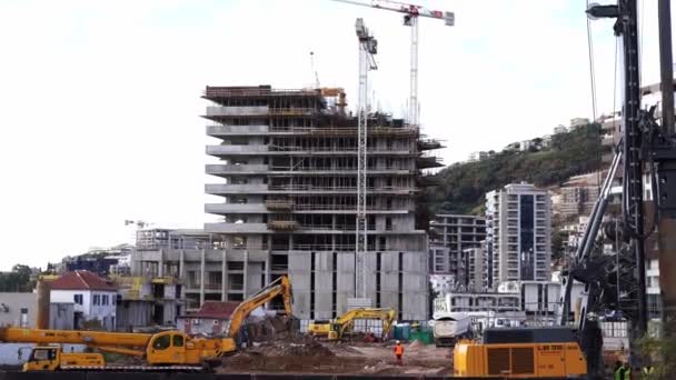 Excavators Cranes Work Construction Site Multistory Building High Quality Footage — Video