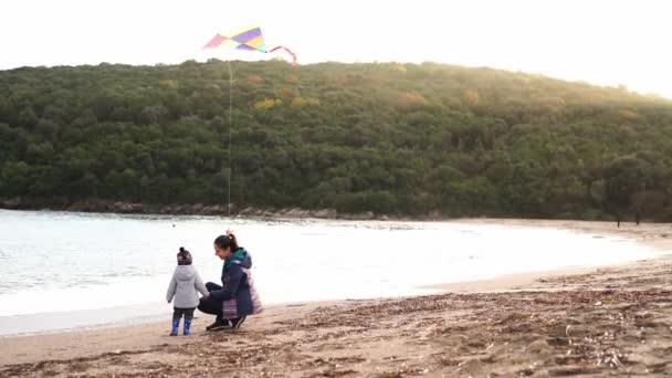 Mom Little Girl Sits Sandy Beach Holds Kite Her Hand — Video