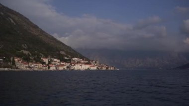 Coast of Perast at the foot of the mountains. Montenegro. High quality FullHD footage