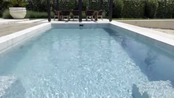 Swimming Pool Turquoise Water Pergola Hotel Garden High Quality Footage — Stockvideo