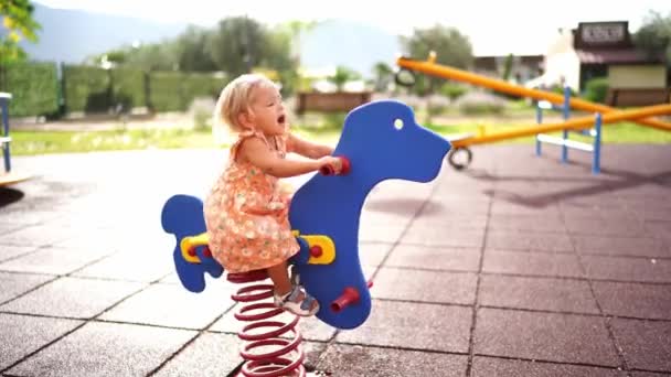 Little Girl Swings Swing Balancer Holding Handles Opening Her Mouth — Stockvideo