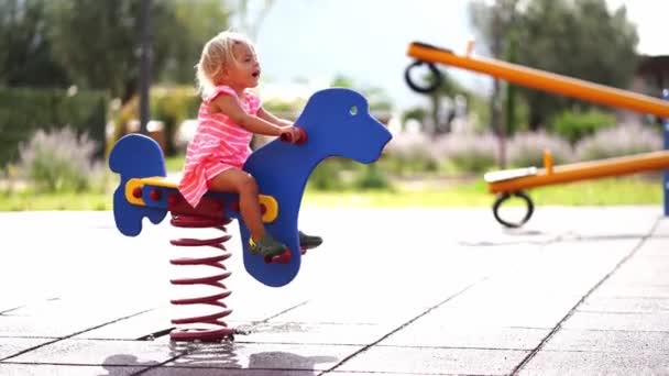 Little Girl Swinging Spring Swing Playground High Quality Footage — Vídeo de stock