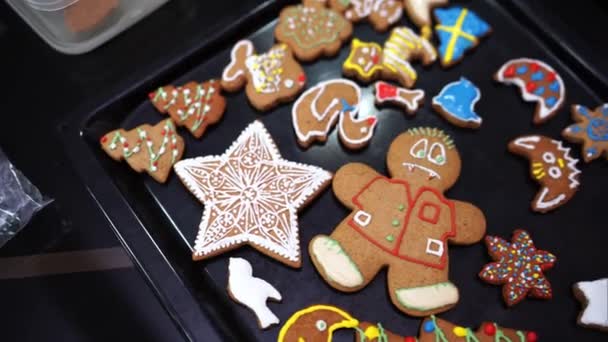Multi Colored Gingerbread Glaze Ornaments Lie Tray High Quality Footage — Stock video