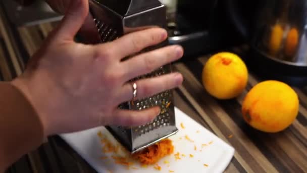 Man Removes Grated Orange Zest Grater Plate High Quality Footage — Wideo stockowe