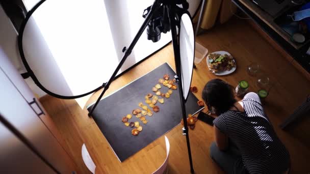Photographer Stoker Taking Photo Dried Fruit Snack Word Dark Background — Video Stock