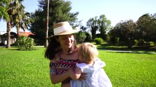 Mom Circles Little Girl Her Arms Green Meadow High Quality — Stockvideo