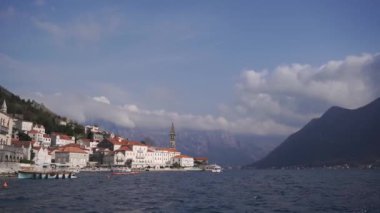 Old town at the foot of the mountains on the seashore. Montenegro. High quality FullHD footage