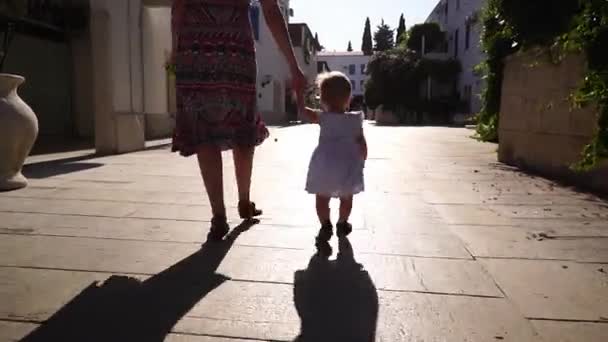 Mom Little Girl Walks Yard Houses Holding Hands High Quality — 비디오