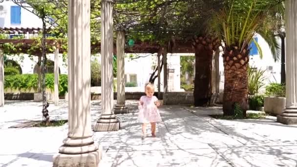 Little Girl Bottle Water Her Hand Walks Barefoot Tiles Pergola — Video Stock