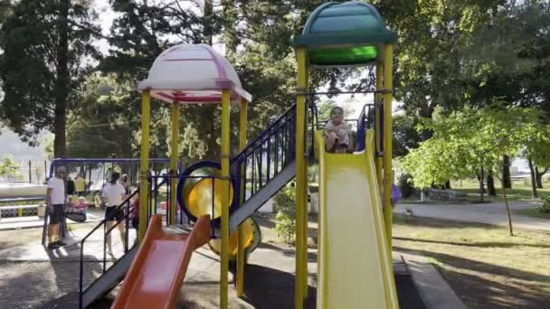 Little Girl Slides Slide Playground Soft Toy High Quality Footage — Stock videók