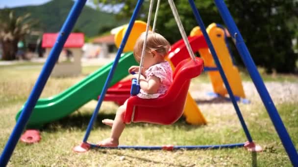 Little Girl Napping Swinging Swing High Quality Footage — Wideo stockowe