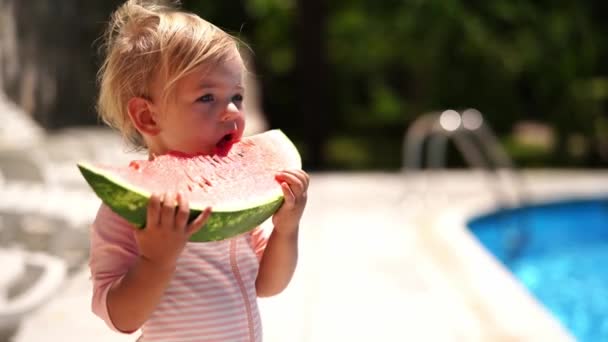 Little Girl Eating Large Piece Watermelon Holding Both Hands High — Video Stock
