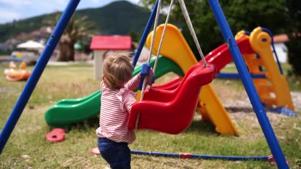 Little Girl Runs Swing Balance Beam Playground High Quality Footage — Wideo stockowe