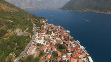 Church of St. Nicholas among the old houses of Perast. Montenegro. High quality 4k footage