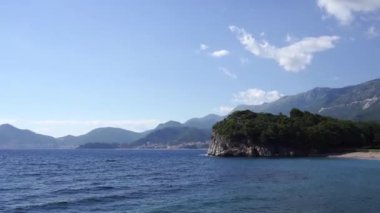 Beach near Villa Milocer at the foot of the mountains. High quality FullHD footage