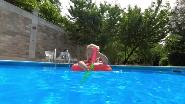 Little Girl Toy Inflatable Ring Swims Pool High Quality Footage — Video Stock