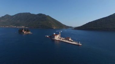 Island of Gospa od Skrpjela with the island of St. George in the background. Montenegro. High quality 4k footage