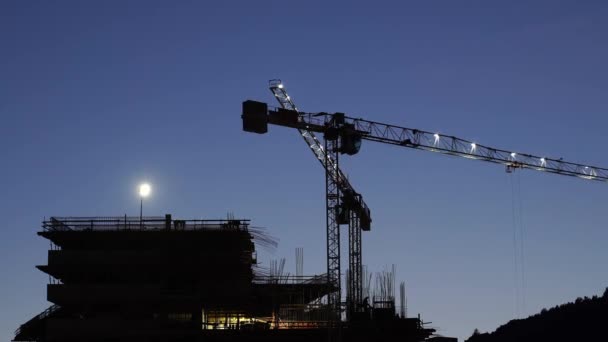 Illuminated Tower Cranes Work Construction Site Dusk Time Lapse High — Video