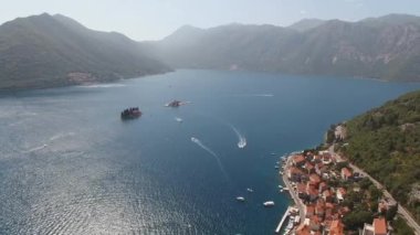 Aerial view of the coast of Perast and the islands in the Kotor Bay. High quality 4k footage