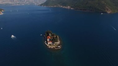 Green cypress trees on the island of St. George. Montenegro. High quality 4k footage