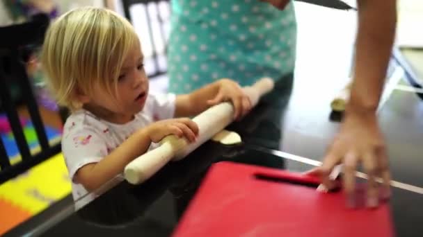 Mom Cuts Dough Pieces Little Girl Rolls Out Rolling Pin — Wideo stockowe