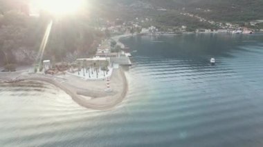 Private hotel by the sea with a beach and a pier. High quality 4k footage