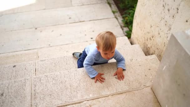 Little Girl Crawling Stairs Her Stomach Backwards High Quality Footage — Stock video