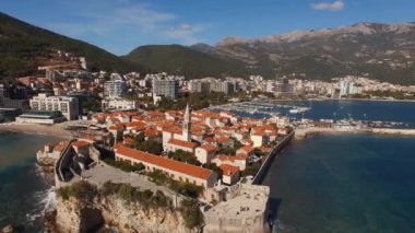 Old Budva with stone houses and a high bell tower. Montenegro. High quality 4k footage