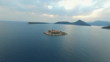 Ancient fortress on an island in the bay. Drone. High quality 4k footage