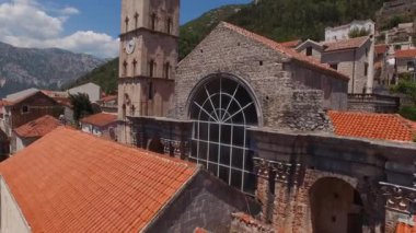Church of St. Nicholas with a high tower in Perast. Montenegro. High quality 4k footage