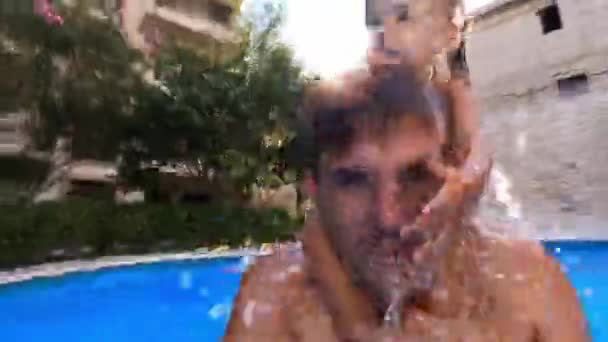 Dad Jumps Diving Water Pool Little Girl His Shoulders High — Stockvideo
