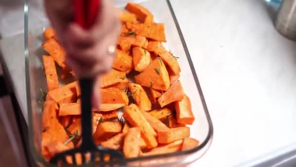 Woman Stirring Baked Rosemary Sweet Potato Spatula High Quality Footage — Vídeo de Stock