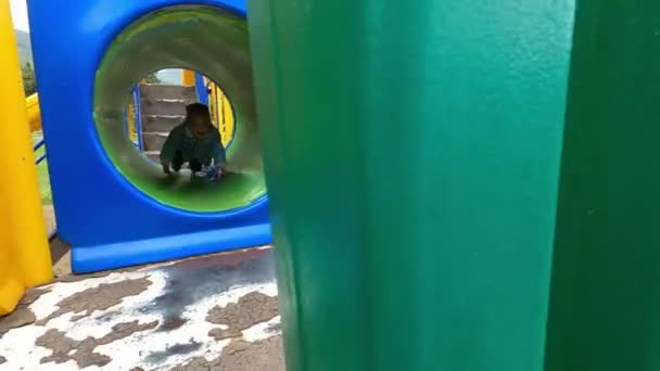 Little Girl Plush Hare Her Hand Crawls Pipe Playground High — Stock Video