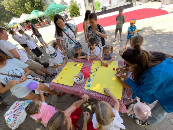 Stock image Little children draw posters on the table in the street in protest. High quality photo